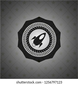 rocket icon inside realistic black emblem