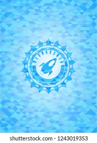 rocket icon inside realistic sky blue mosaic emblem