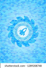rocket icon inside realistic sky blue emblem. Mosaic background