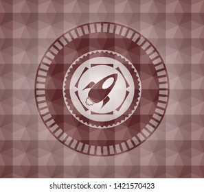 rocket icon inside red seamless geometric badge.