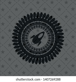 rocket icon inside retro style black emblem