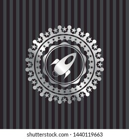 rocket icon inside silver badge