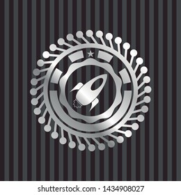 rocket icon inside silvery shiny emblem