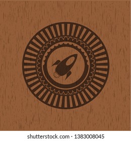 rocket icon inside wood emblem. Retro