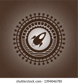 rocket icon inside wood emblem