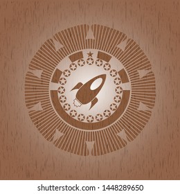 rocket icon inside wood emblem