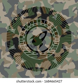rocket icon on camo pattern