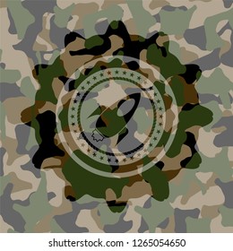 rocket icon on camouflaged pattern