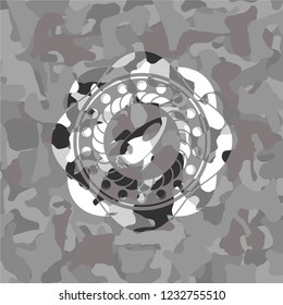 rocket icon on grey camo texture