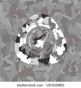 rocket icon on grey camo pattern
