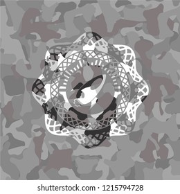 rocket icon on grey camouflaged texture