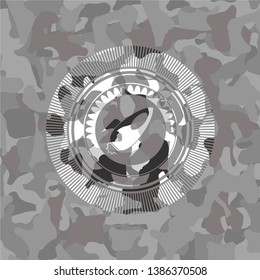 rocket icon on grey camouflaged pattern