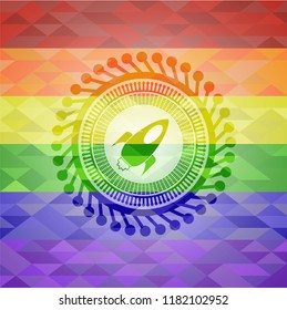 rocket icon on mosaic background with the colors of the LGBT flag