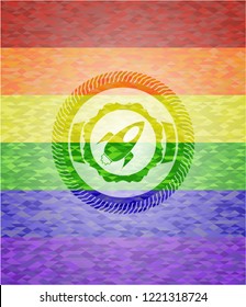rocket icon on mosaic background with the colors of the LGBT flag