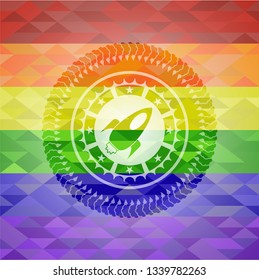 rocket icon on mosaic background with the colors of the LGBT flag