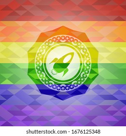 rocket icon on mosaic background with the colors of the LGBT flag