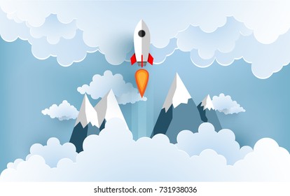rocket illustration flying over cloud. design paper art and handicraft