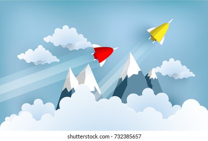 rocket illustrations fly across clouds and mountains. design paper art and handicraft