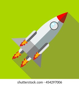 Rocket launch icon in flat style icon in flat style on a green background