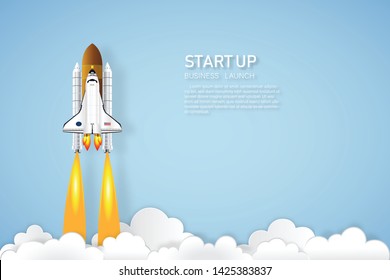 Rocket launch on the clouds and blue sky as paper art, craft style and business Startup project concept. flat design vector illustration. 