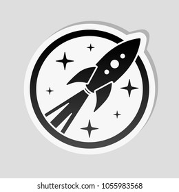rocket launch with stars in circle icon. Sticker style with white border and simple shadow on gray background