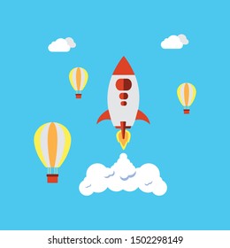 Rocket launching over the hot air balloons. competition concept background 
