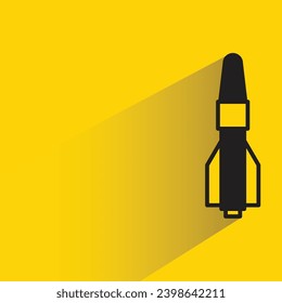 icono de cohetes y misiles con sombra sobre fondo amarillo