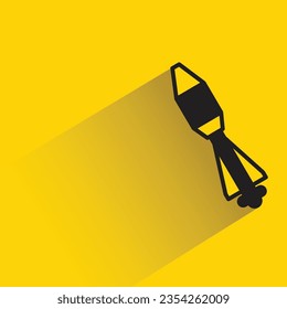 rocket with shadow on yellow background