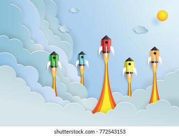Rocket ship flying on cloud and blue sky.Paper art style of start up and business team work creative concept idea.Vector illustration.