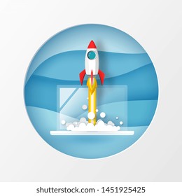 Rocket or space ship in circle frame launch from laptop to the blue sky on presentation template background in vector paper art concept. Business market or startup product - project concept.