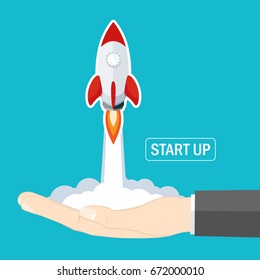 rocket start up launch from businessman hand flat vector