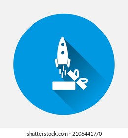 Rocket vector icon flying out of the box icon on blue background. Flat image with long shadow.