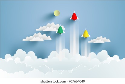 rockets flying over clouds. art paper and crafts. vector landscape illustration