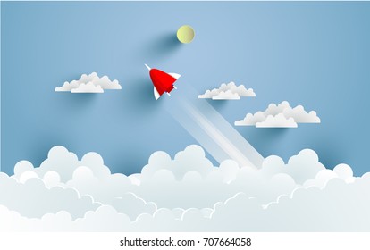 rockets flying over clouds. art paper and crafts. vector landscape illustration