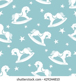 Rocking horse hand drawn seamless pattern. Doodle background vector. Cartoon illustration with stars 