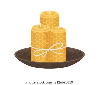 Rolled honeycomb candles in bowl. Natural beeswax pillars with honey scent. Handmade cosy home interior decoration tied with string. Flat vector illustration isolated on white background