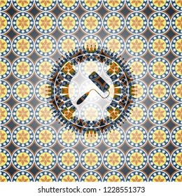 roller brush icon inside arabesque badge. arabic decoration.