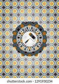 roller brush icon inside arabesque emblem background. arabic decoration.