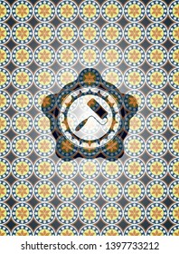 roller brush icon inside arabesque style emblem. arabic decoration.