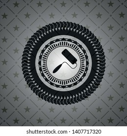 roller brush icon inside black emblem