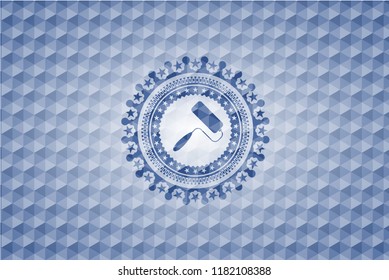  roller brush icon inside blue emblem or badge with abstract geometric polygonal pattern background.
