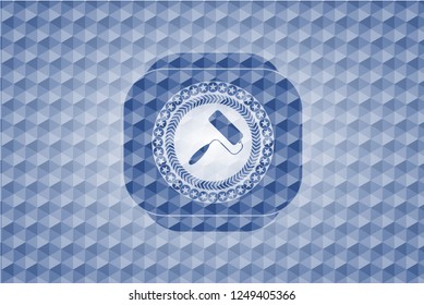 roller brush icon inside blue badge with geometric pattern background.