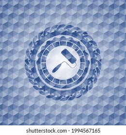 roller brush icon inside blue emblem or badge with abstract geometric polygonal pattern background. 