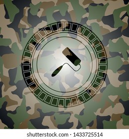 roller brush icon inside camouflage texture