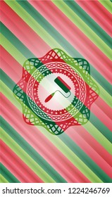 roller brush icon inside christmas emblem background.