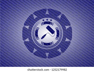 roller brush icon inside denim background
