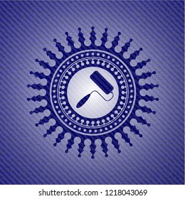 roller brush icon inside emblem with jean texture