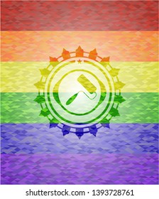 roller brush icon inside emblem on mosaic background with the colors of the LGBT flag