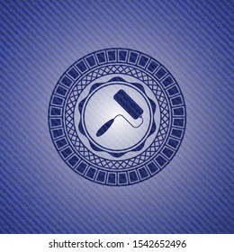roller brush icon inside emblem with jean texture