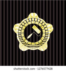 roller brush icon inside gold emblem